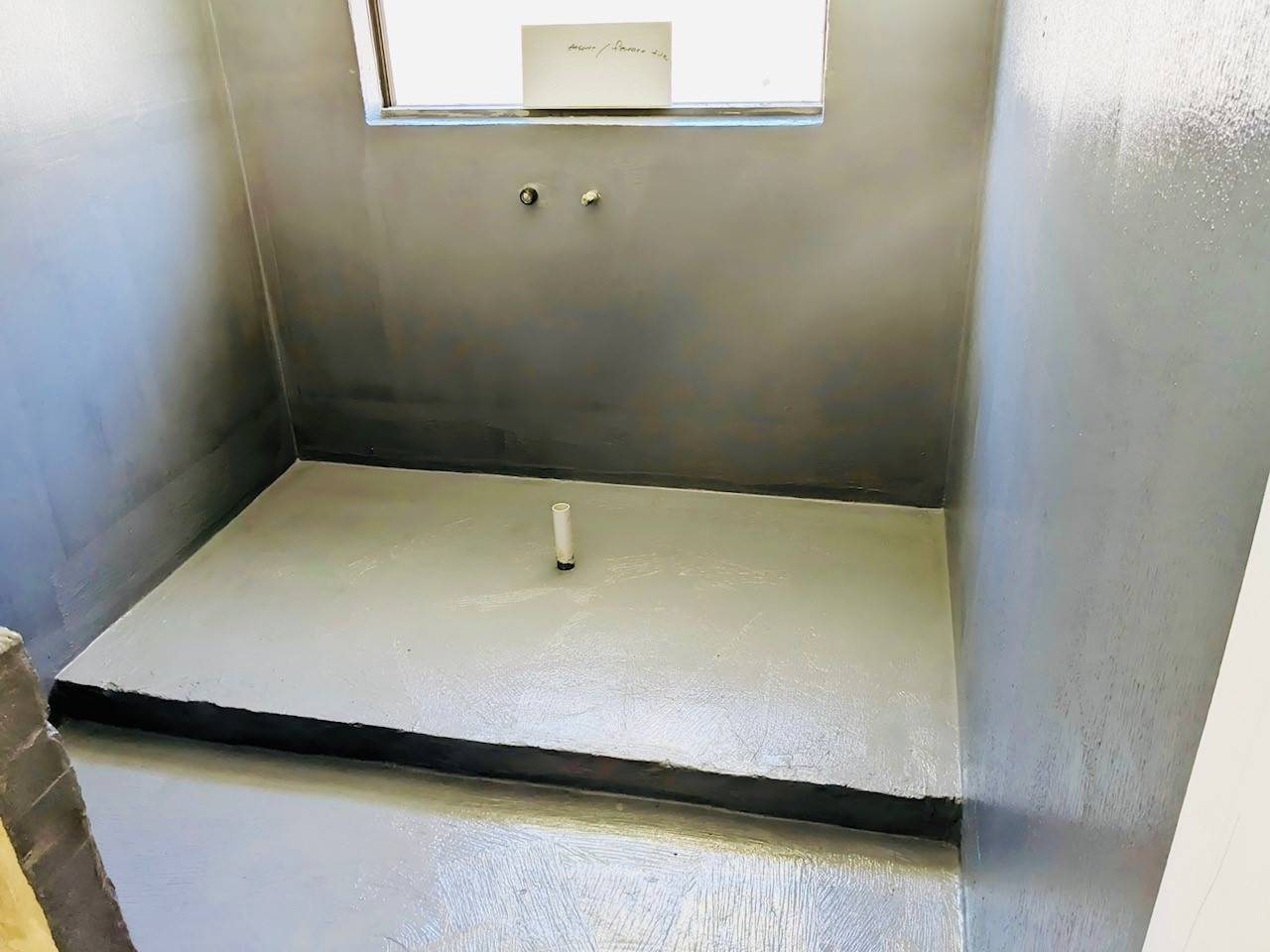 Prepared shower recess ready for waterproofing work